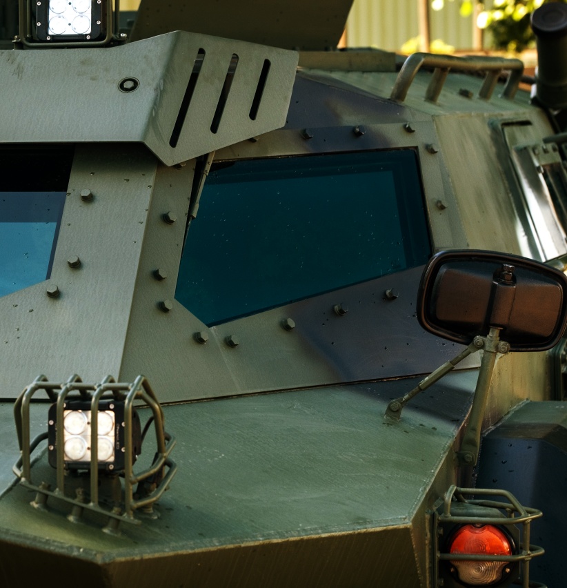 military armored suv of green color.military concept